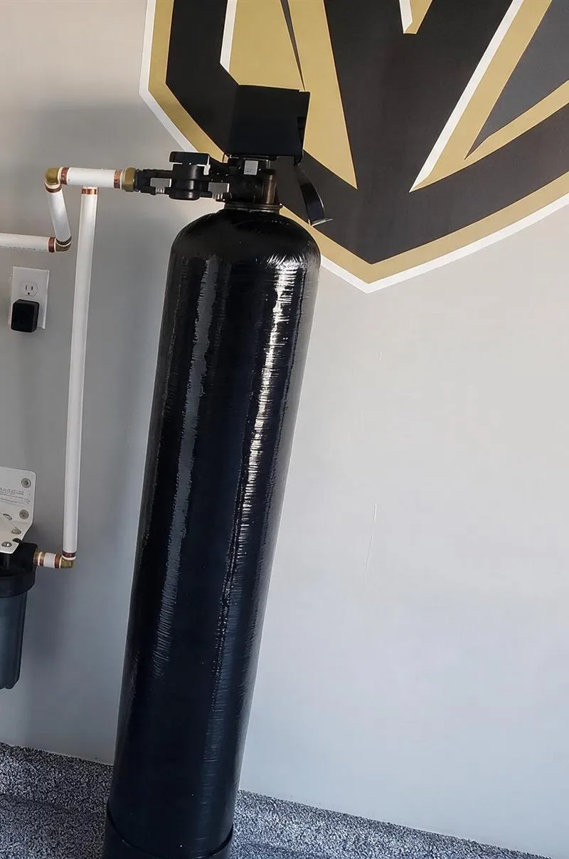 An AquaSure whole-home water softener installed by our team in a Las Vegas garage
